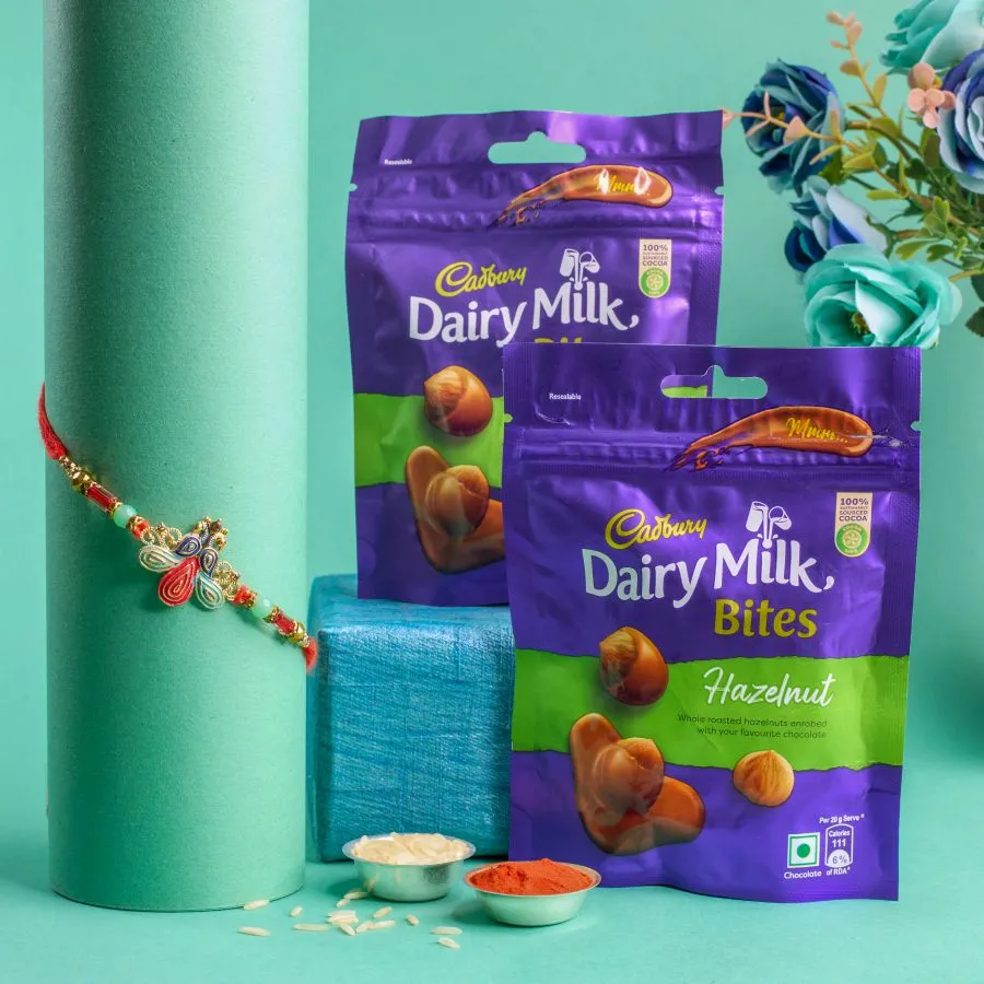 Vibrant Peacock Rakhi & Hazelnut Treats 1