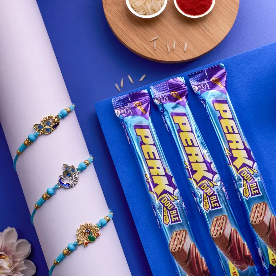 Joyful Peacock Rakhi Set With Cadbury Treats 1